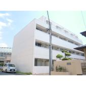 タケミツ幕張本郷マンション 外観写真1 清潔な白い外観