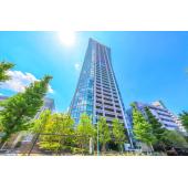 パークコート渋谷　ザ　タワー 外観写真1 上層部の曲線デザインが特徴的なマンション外観