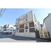 ヴェルビュ横浜 外観写真1 外壁タイル張り、鉄筋コンクリート造地上７階建のマンション