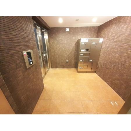 （新築）デスパシオ 外観写真3 ロビー