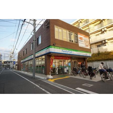 ギャレ豊津 周辺環境写真1 ファミリーマート吹田垂水町一丁目店：306m